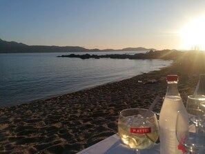 On the beach, sun loungers