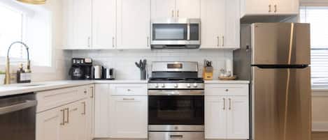 Fridge, oven, coffee/tea maker, toaster