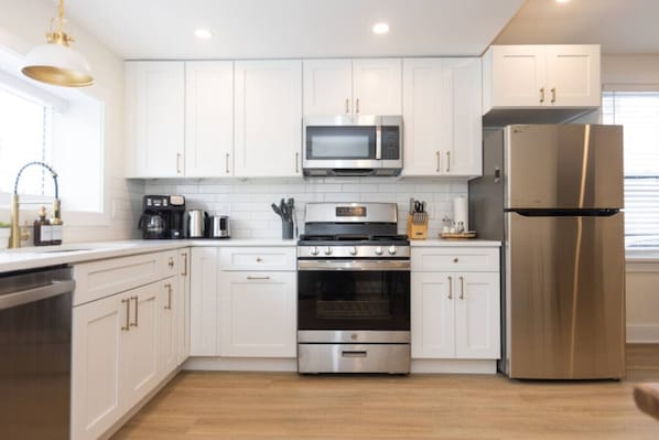 Fridge, oven, coffee/tea maker, toaster