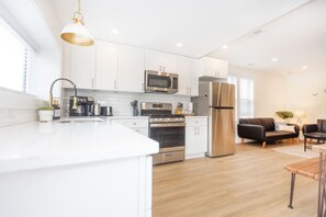 Fridge, oven, coffee/tea maker, toaster