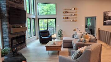 Smart TV, fireplace, foosball, books