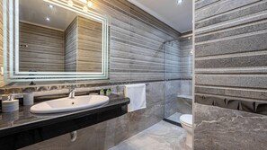Jetted bath, bidet, towels, soap