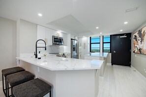 Condo, Multiple Beds (Coastal modern beachfront condo with ) | Private kitchen - Coastal Modern Beachfront Condo With Sweeping Views (Marco Island)