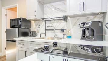 Fridge, microwave, stovetop, coffee/tea maker