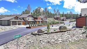 A residential area with houses, a street named Grubstake Ct., and a rocky landscape. - Gold Rush Charm Meets Modern Comfort (Rapid City)