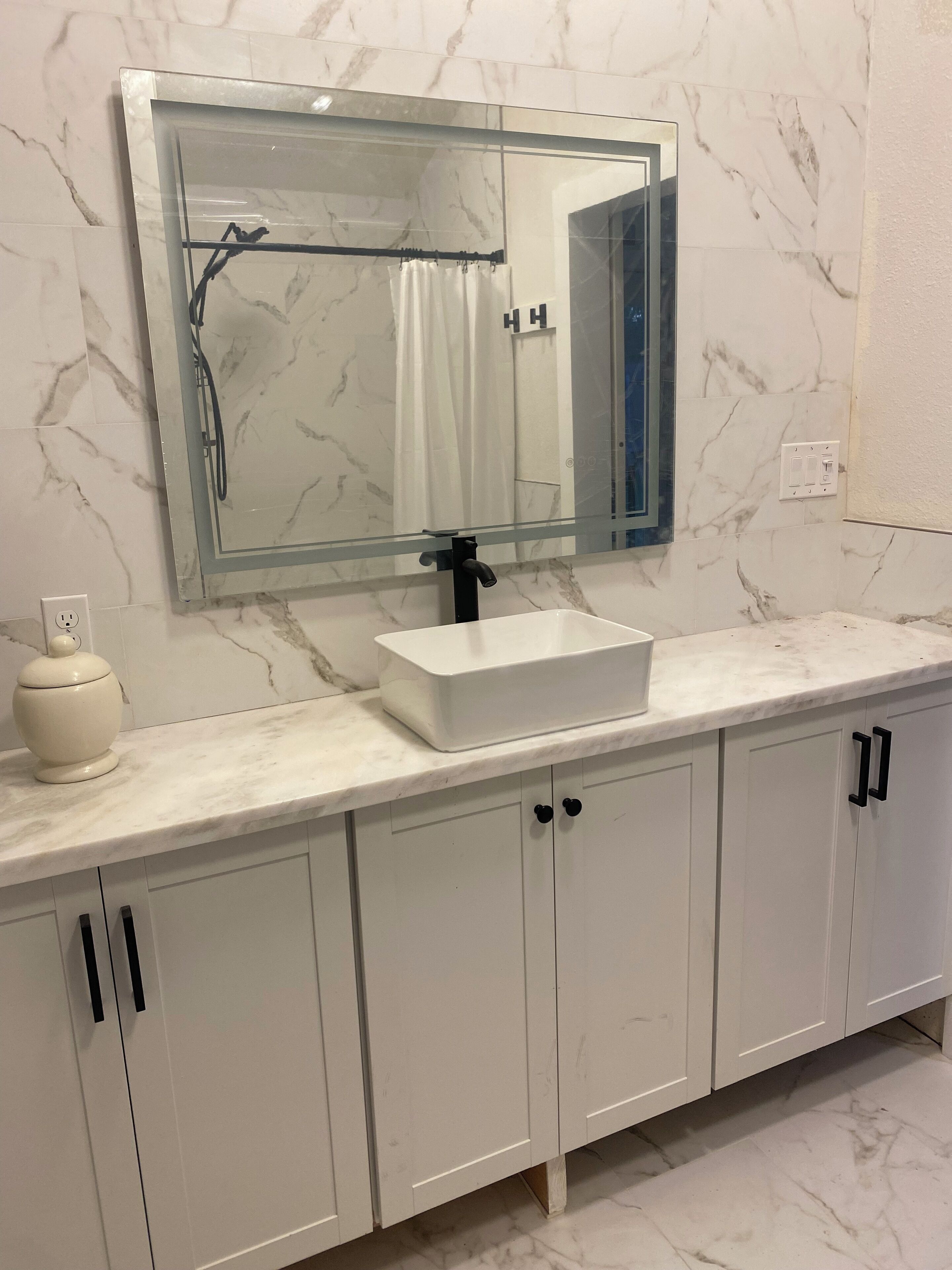 Shower, towels, soap, toilet paper