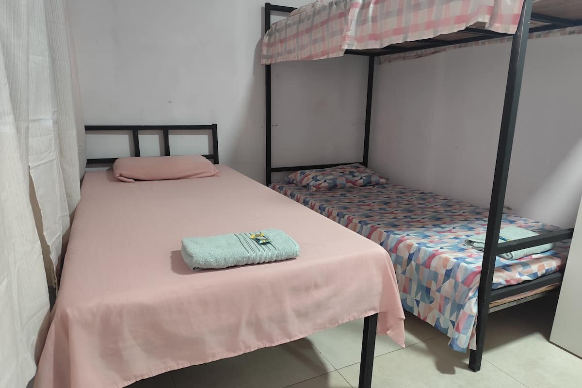 Economy Triple Room, Garden View | Iron/ironing board, free WiFi