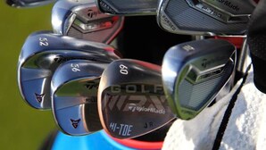 A close-up of a golf club head with the inscription "TaylorMade" and "Hi-Tee Jr." - Palm Luxe Estate Luxury Desert Retreat With Pool (Indio)