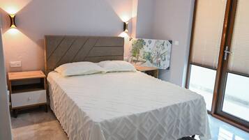 Apartamento família, vista para o jardim