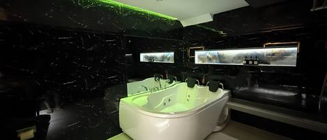 Shower, jetted tub, hair dryer, bidet