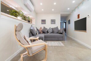 Living area - une retraite de qualité au niveau du jardin en centre-ville (Montréal)