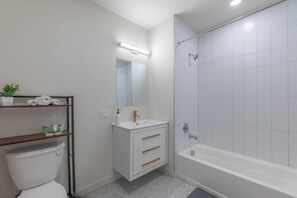 Hair dryer, towels, soap, shampoo