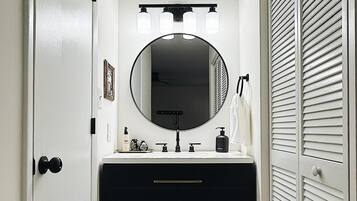 Hair dryer, towels, soap, shampoo