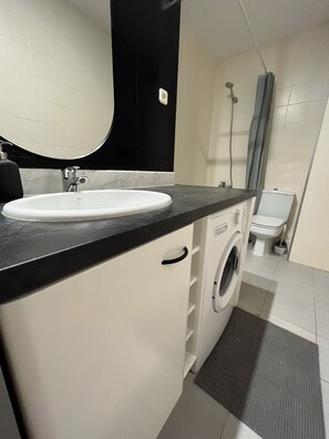 Hair dryer, towels, soap, toilet paper