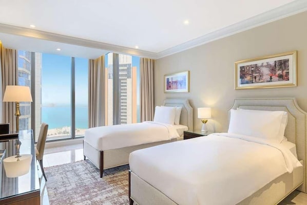 Executive Suite, 2 Bedrooms, Sea View | In-room safe, desk, laptop workspace, iron/ironing board