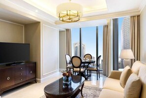 Junior Suite, Sea View | In-room safe, desk, laptop workspace, iron/ironing board