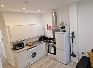 Appartamento, vista città | Cucina privata