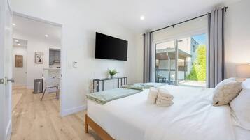 2 habitaciones, tabla de planchar con plancha y cuna de viaje