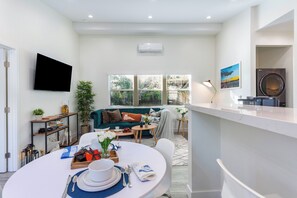 Smart TV, fireplace, books