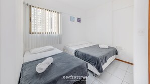 A hotel room with two single beds, white bedding, a window with blinds, and a small wall-mounted artwork. - Apart w/ Pool 450m From the Beach, Maceio Eez0301 (Maceió)