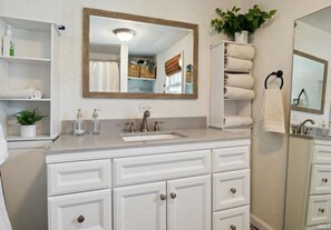 Hair dryer, towels, soap, toilet paper