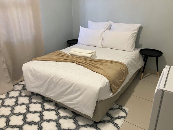 1 غرفة نوم ومكواة/لوح كي وواي فاي وملاءات أسرّة