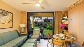 Condo, 1 Bedroom, Lanai, Partial Ocean View | Living area | 36-inch LCD TV with cable channels