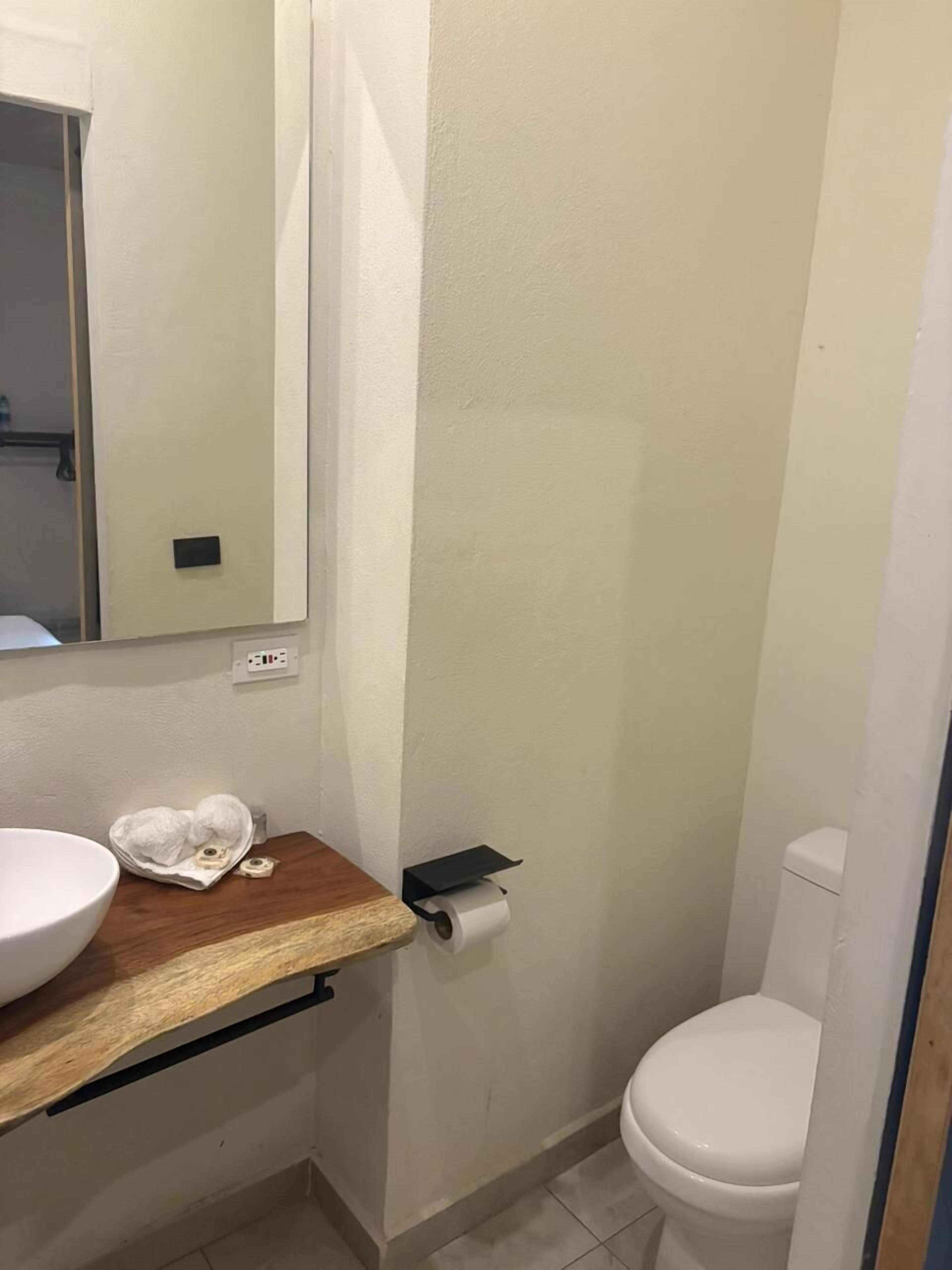 Double Room | Bathroom | Shower, towels, soap, shampoo
