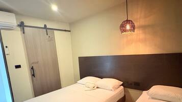 Habitació triple Deluxe | Wifi gratuïta