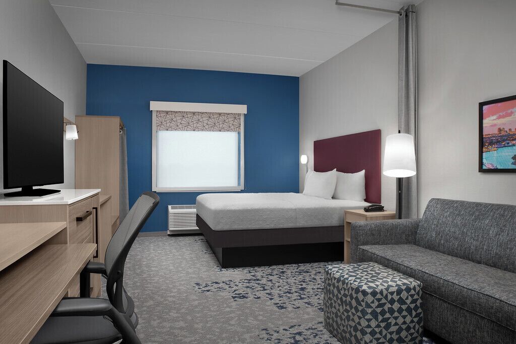 Suite estudio, 1 cama King size y sofá cama | Ropa de cama hipoalergénica y caja de seguridad en la habitación 