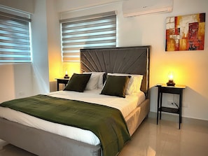 Appartement Deluxe, vue ville | Rideaux occultants, fer et planche à repasser, Wi-Fi gratuit