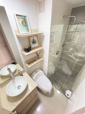 Shower, hair dryer, towels, soap