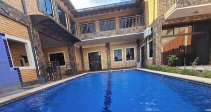 Breakfast, swimming pool, pool table, foosball.
