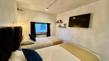 2 habitaciones, tabla de planchar con plancha, wifi y ropa de cama