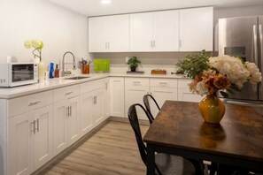 Fridge, microwave, coffee/tea maker, toaster