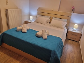 1 bedroom, desk, iron/ironing board, travel cot