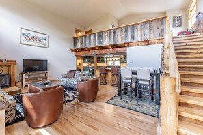 Smart TV, fireplace, books