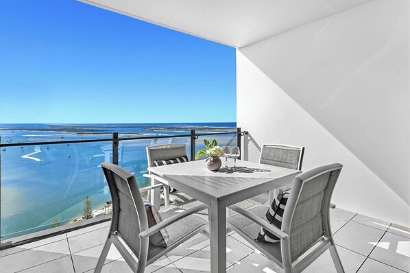 Outdoor dining - Brand New High-level Ocean View 2BR Retreat (Southport)
