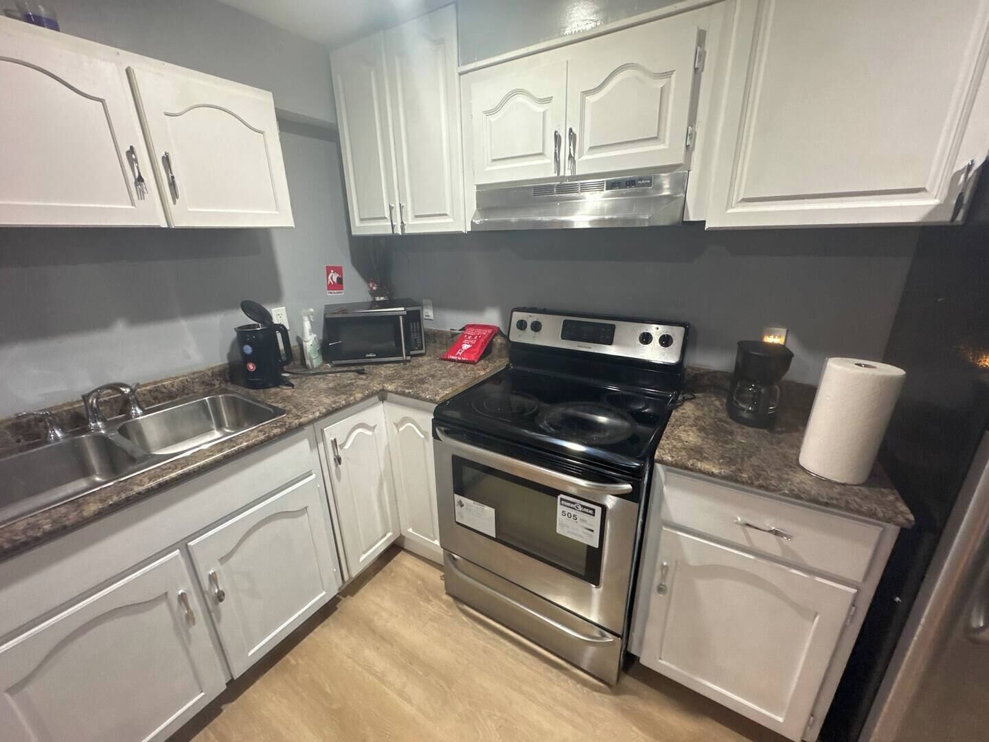 Fridge, microwave, stovetop, coffee/tea maker