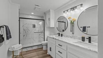 Shower, hair dryer, towels, soap