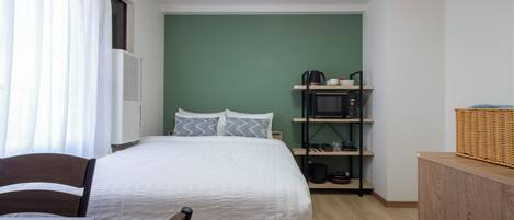 1 slaapkamer, een strijkplank/strijkijzer, gratis wifi, beddengoed