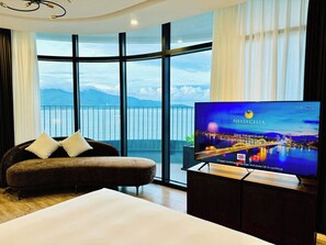 Quarto casal grand, vista parcial para o oceano | Frigobar, cofres nos quartos, escrivaninha