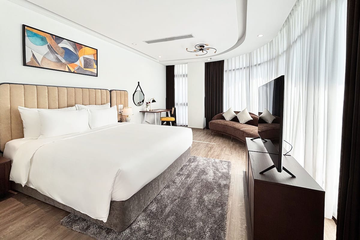 Quarto casal grand, vista para o oceano | Cofres nos quartos, escrivaninha, Wi-Fi de cortesia, roupa de cama