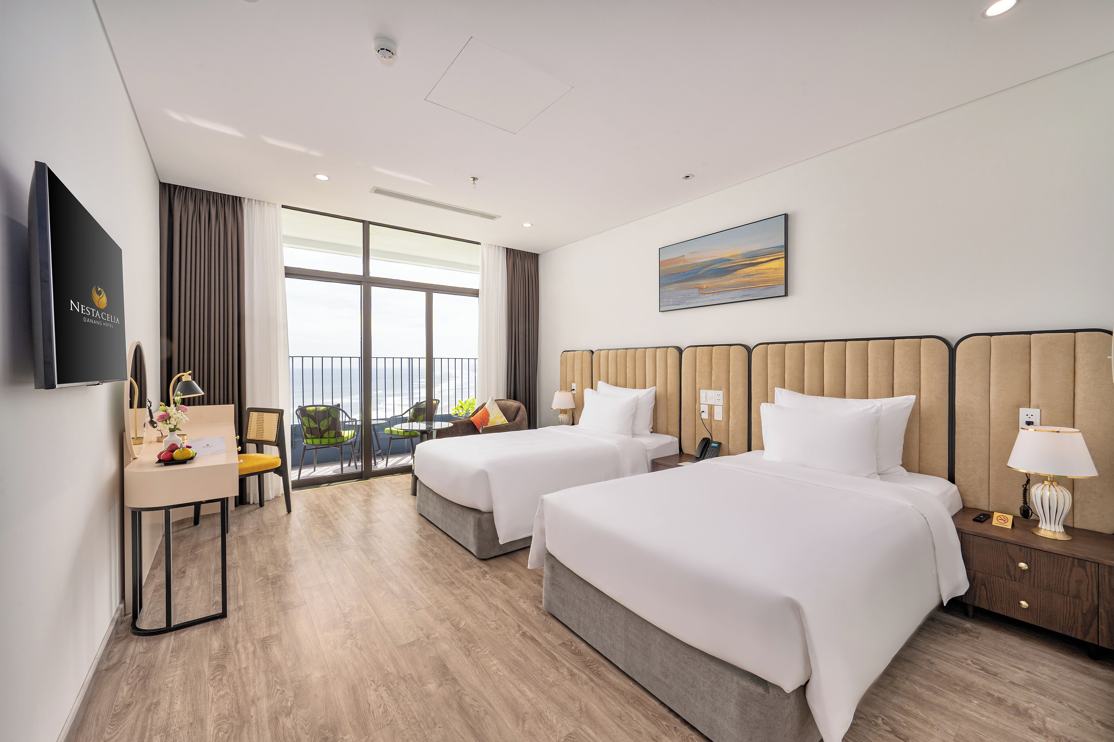 Chambre « Premier » avec lits jumeaux, vue partielle sur l'océan