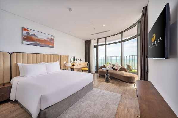 Premier Double Room, Partial Ocean View | Minibar, in-room safe, desk, laptop workspace