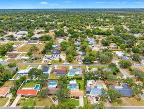 A residential area with houses, streets, and green spaces. - Brandon Getaway | 4BR Home w/ Pool & Hot Tub (Brandon)