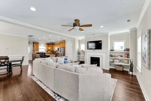 TV, fireplace, books, offices
