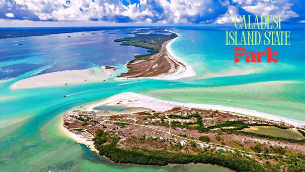 Vista aérea del Parque Estatal de Caladesi, con aguas turquesas cristalinas, playas de arena y una combinación de zonas naturales y desarrolladas.