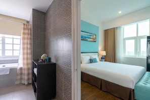 Shower, rainfall showerhead, slippers, towels