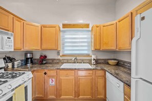 Microwave, stovetop, dishwasher, coffee/tea maker